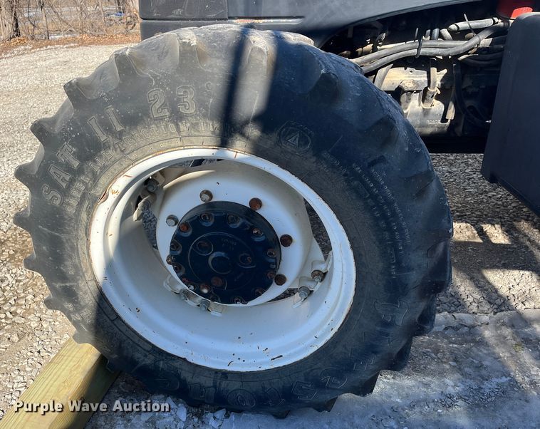 image for item LP9810 2003 New Holland TL90  MFWD tractor