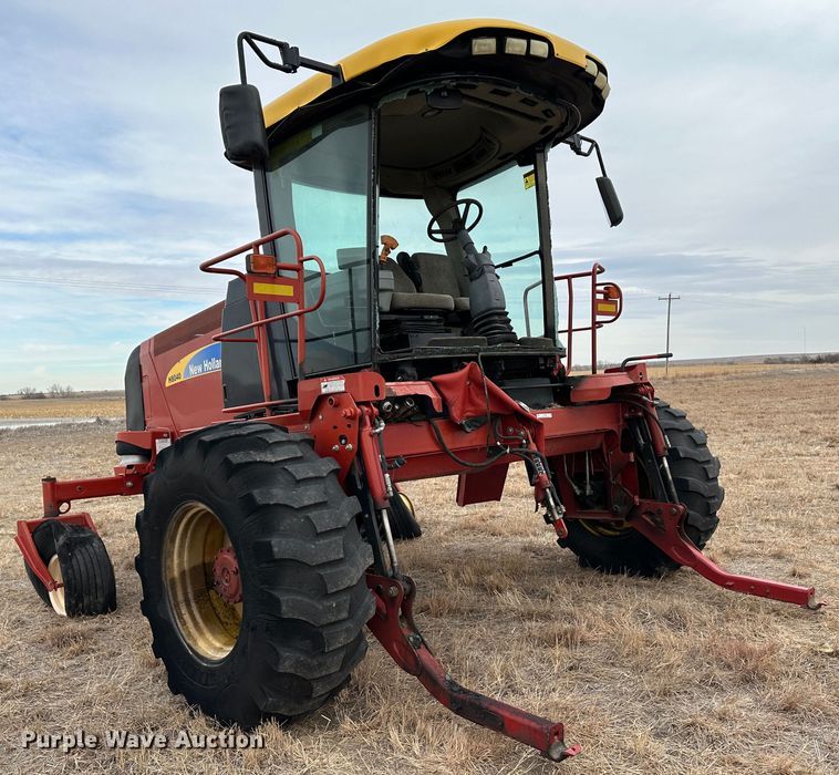 image for item LT9305 2011 New Holland H8040  swather / windrower