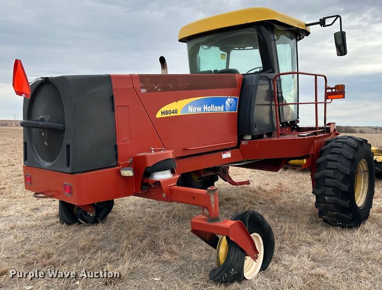 image for item LT9305 2011 New Holland H8040  swather / windrower