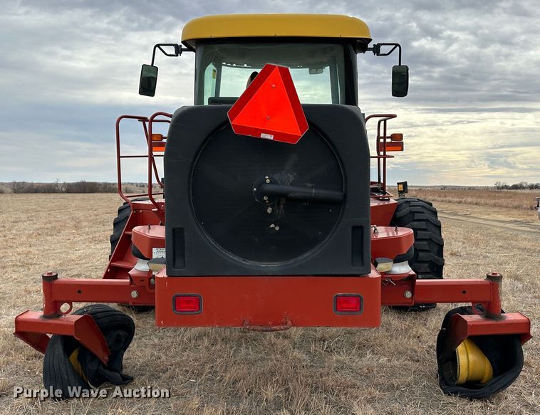 image for item LT9305 2011 New Holland H8040  swather / windrower