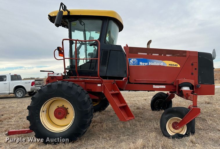 image for item LT9305 2011 New Holland H8040  swather / windrower