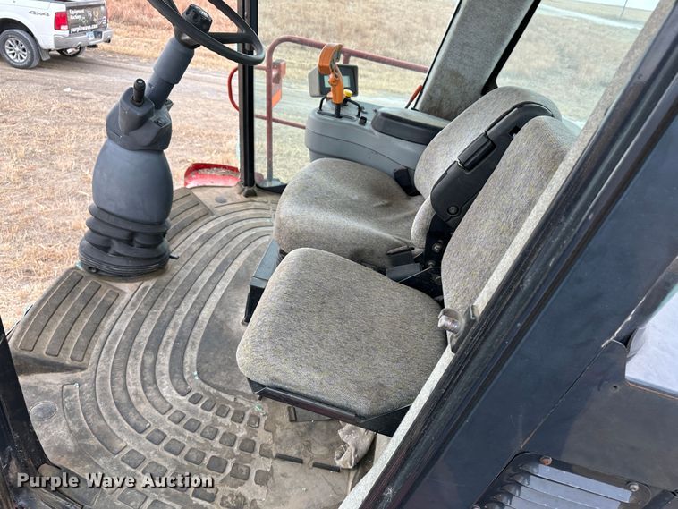 image for item LT9305 2011 New Holland H8040  swather / windrower