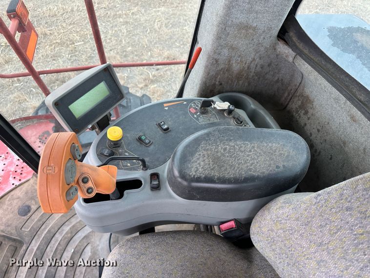 image for item LT9305 2011 New Holland H8040  swather / windrower