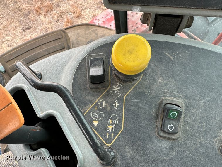 image for item LT9305 2011 New Holland H8040  swather / windrower