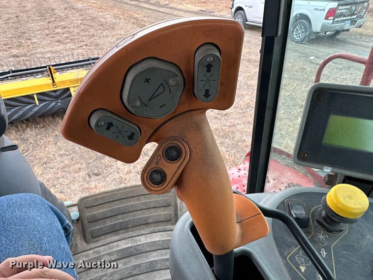 image for item LT9305 2011 New Holland H8040  swather / windrower