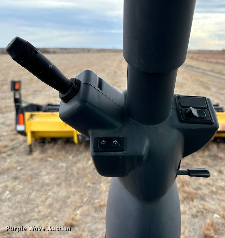 image for item LT9305 2011 New Holland H8040  swather / windrower