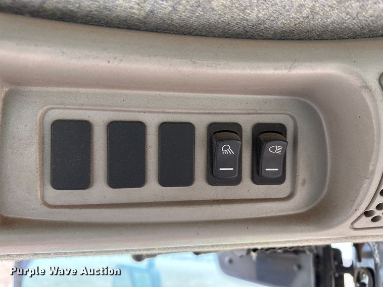 image for item LT9305 2011 New Holland H8040  swather / windrower