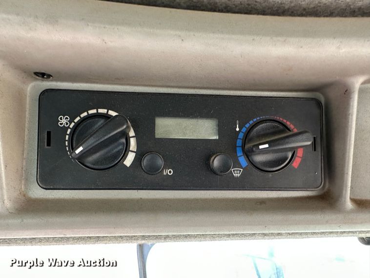 image for item LT9305 2011 New Holland H8040  swather / windrower