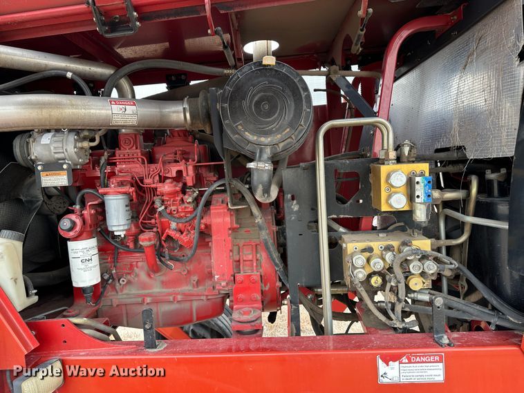 image for item LT9305 2011 New Holland H8040  swather / windrower