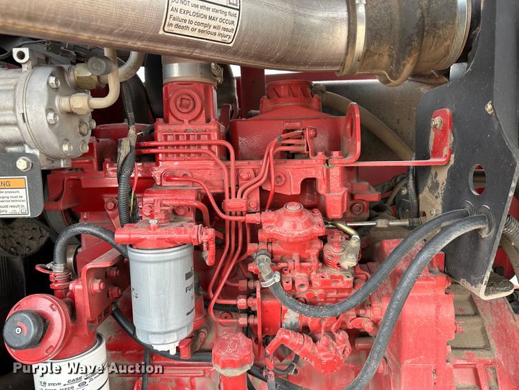 image for item LT9305 2011 New Holland H8040  swather / windrower