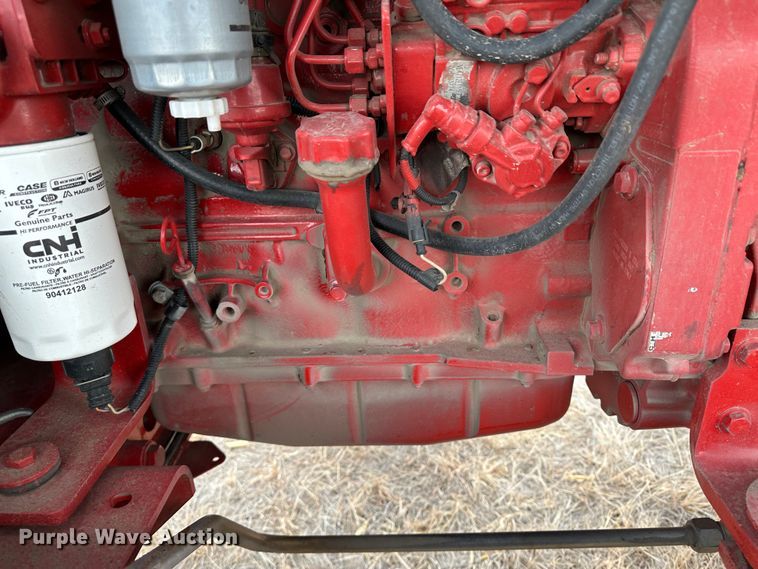 image for item LT9305 2011 New Holland H8040  swather / windrower