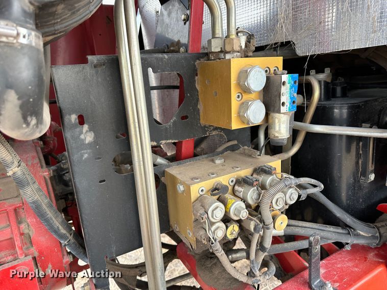 image for item LT9305 2011 New Holland H8040  swather / windrower