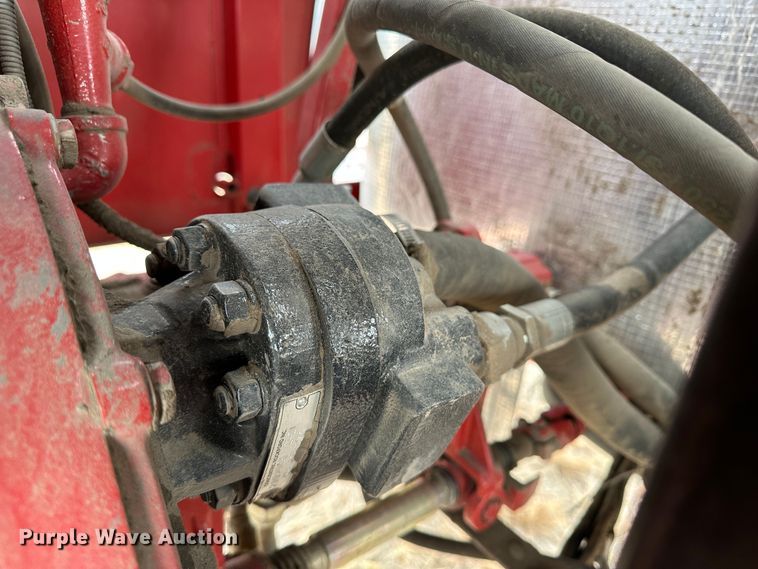 image for item LT9305 2011 New Holland H8040  swather / windrower