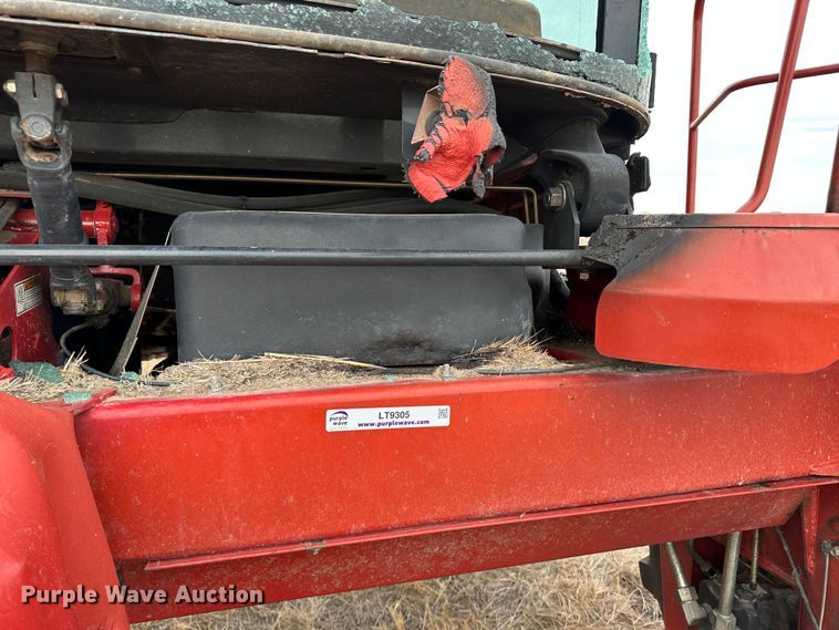 image for item LT9305 2011 New Holland H8040  swather / windrower