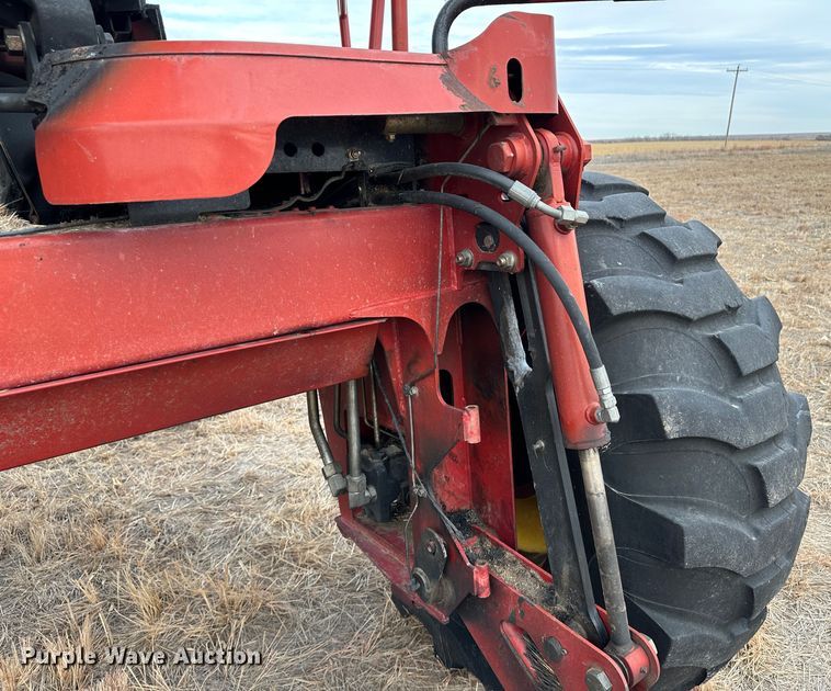 image for item LT9305 2011 New Holland H8040  swather / windrower