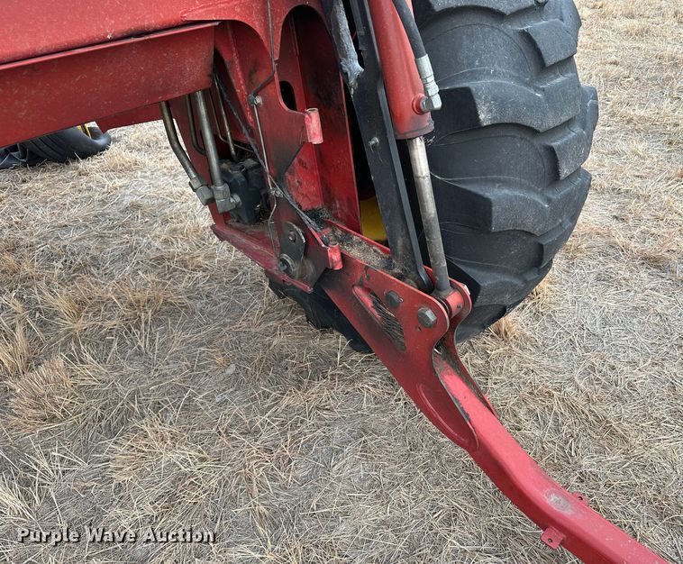 image for item LT9305 2011 New Holland H8040  swather / windrower