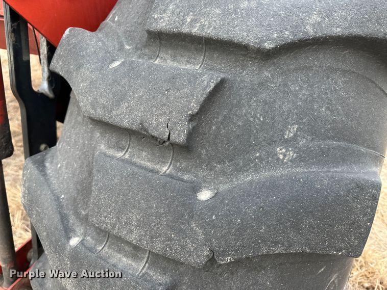 image for item LT9305 2011 New Holland H8040  swather / windrower