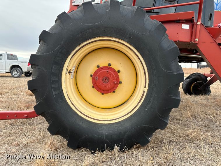 image for item LT9305 2011 New Holland H8040  swather / windrower