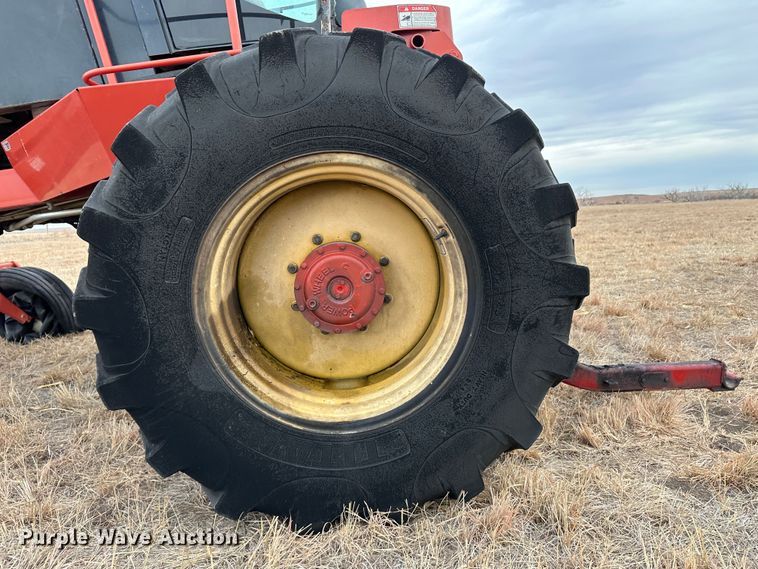 image for item LT9305 2011 New Holland H8040  swather / windrower