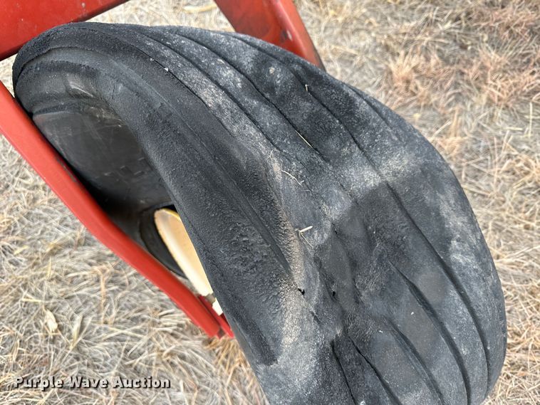 image for item LT9305 2011 New Holland H8040  swather / windrower