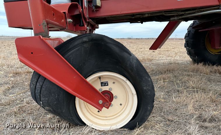image for item LT9305 2011 New Holland H8040  swather / windrower