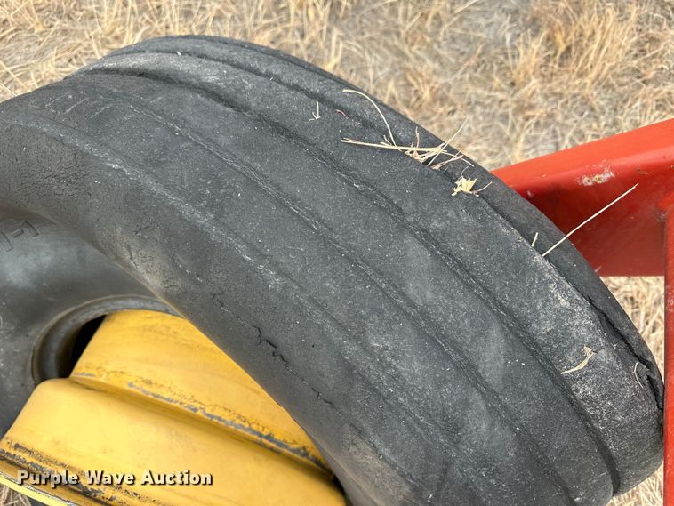 image for item LT9305 2011 New Holland H8040  swather / windrower