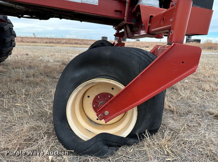 image for item LT9305 2011 New Holland H8040  swather / windrower