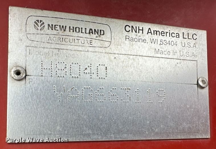 image for item LT9305 2011 New Holland H8040  swather / windrower