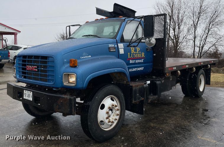 image for item MA9847 2002 GMC C6500  dump flatbed truck