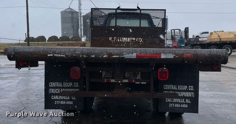 image for item MA9847 2002 GMC C6500  dump flatbed truck