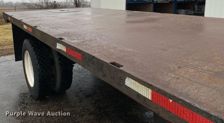 image for item MA9847 2002 GMC C6500  dump flatbed truck