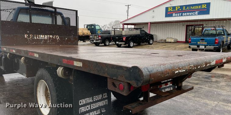 image for item MA9847 2002 GMC C6500  dump flatbed truck