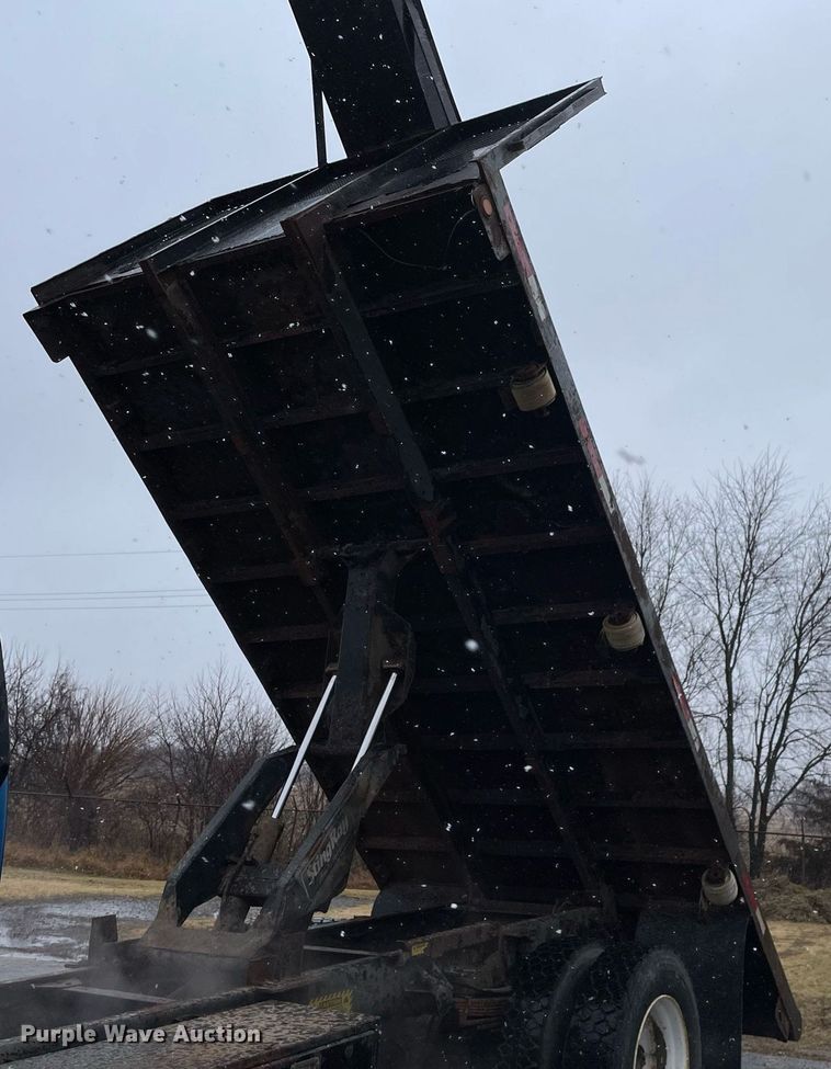 image for item MA9847 2002 GMC C6500  dump flatbed truck