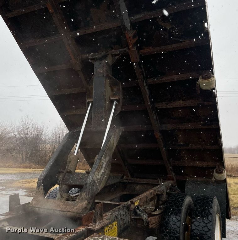 image for item MA9847 2002 GMC C6500  dump flatbed truck