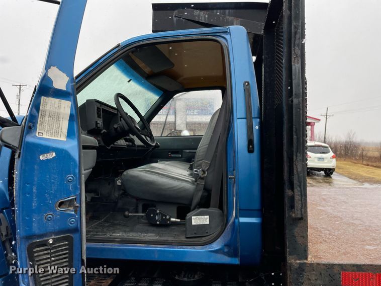 image for item MA9847 2002 GMC C6500  dump flatbed truck