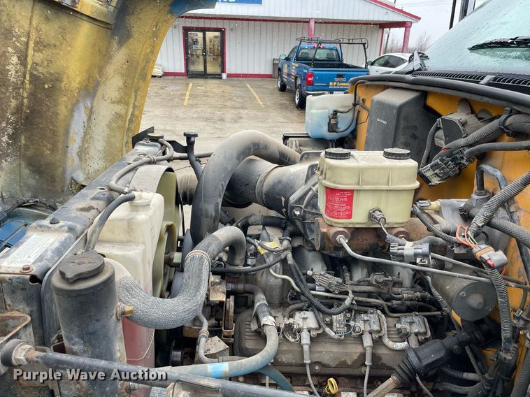 image for item MA9847 2002 GMC C6500  dump flatbed truck