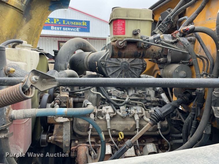 image for item MA9847 2002 GMC C6500  dump flatbed truck