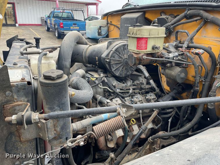 image for item MA9847 2002 GMC C6500  dump flatbed truck