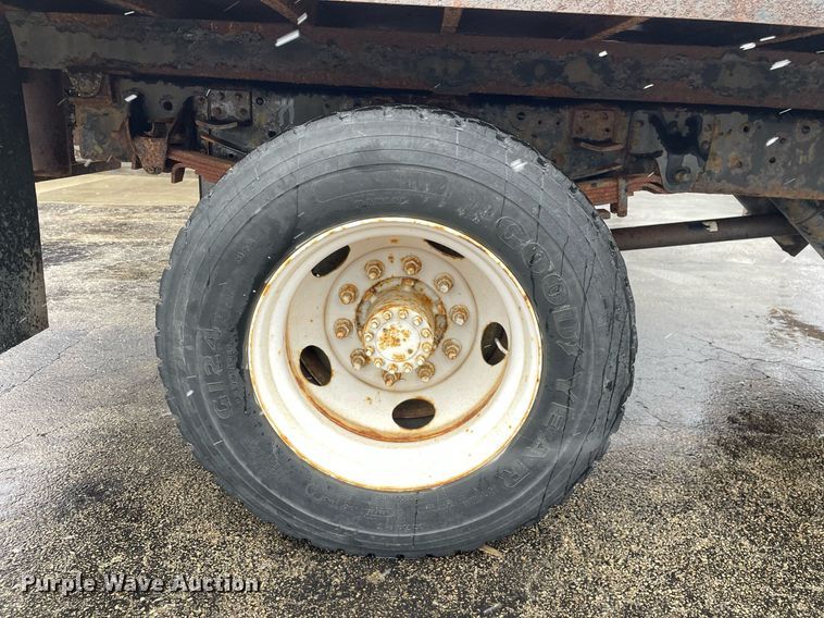 image for item MA9847 2002 GMC C6500  dump flatbed truck