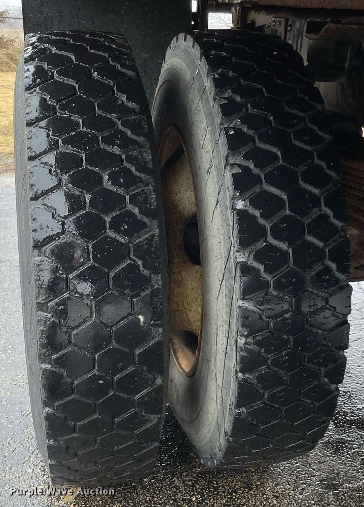 image for item MA9847 2002 GMC C6500  dump flatbed truck