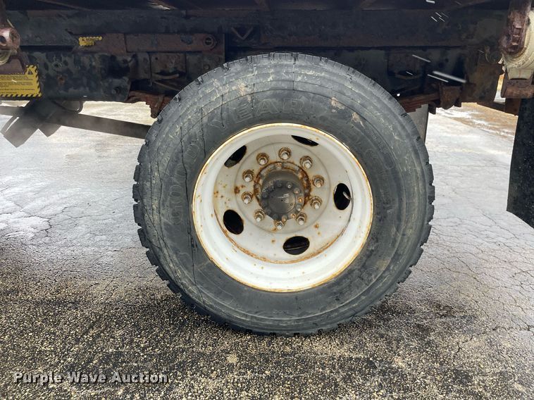 image for item MA9847 2002 GMC C6500  dump flatbed truck