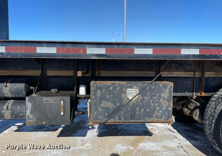 image for item MA9898 2004 Freightliner FL80  flatbed truck