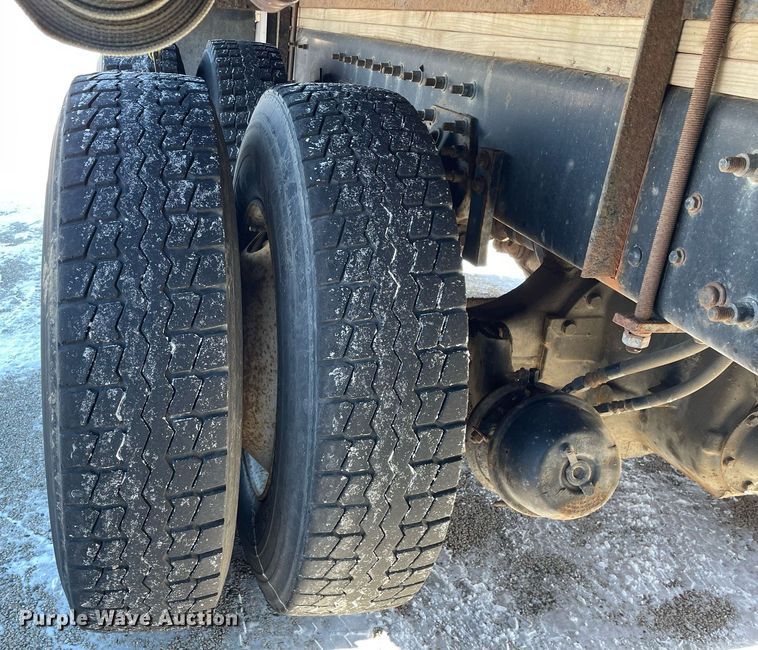 image for item MA9898 2004 Freightliner FL80  flatbed truck