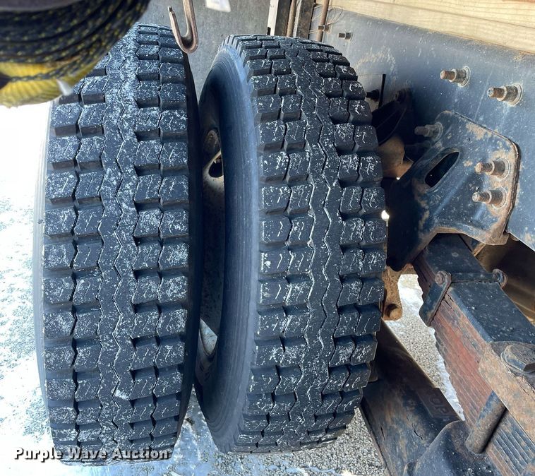 image for item MA9898 2004 Freightliner FL80  flatbed truck