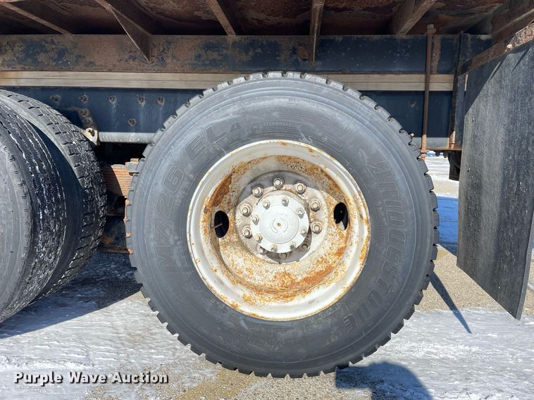 image for item MA9898 2004 Freightliner FL80  flatbed truck