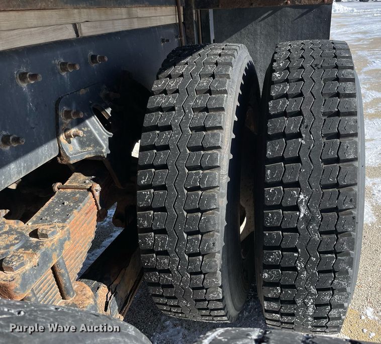 image for item MA9898 2004 Freightliner FL80  flatbed truck