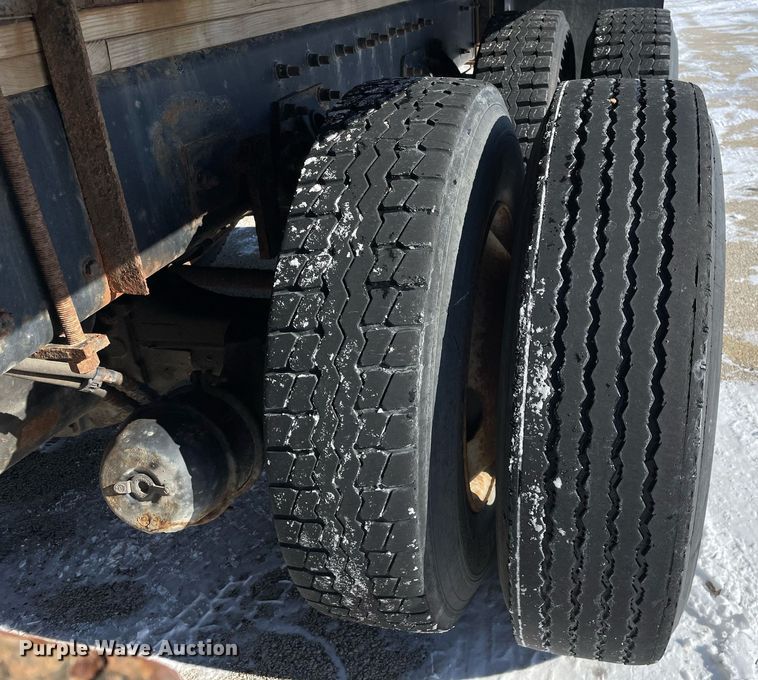 image for item MA9898 2004 Freightliner FL80  flatbed truck