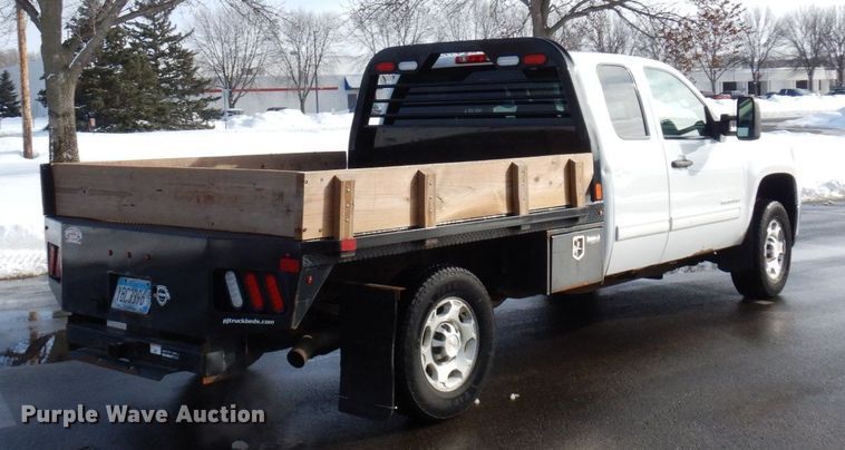 image for item AF9298 2010 GMC Sierra 3500HD  Ext. Cab flatbed pickup truck