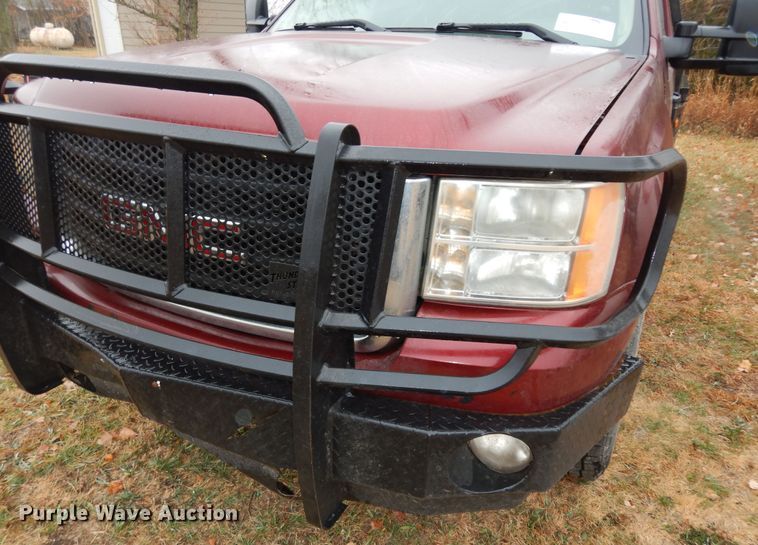 image for item DI6971 2009 GMC Sierra 2500HD  Ext. Cab flatbed pickup truck
