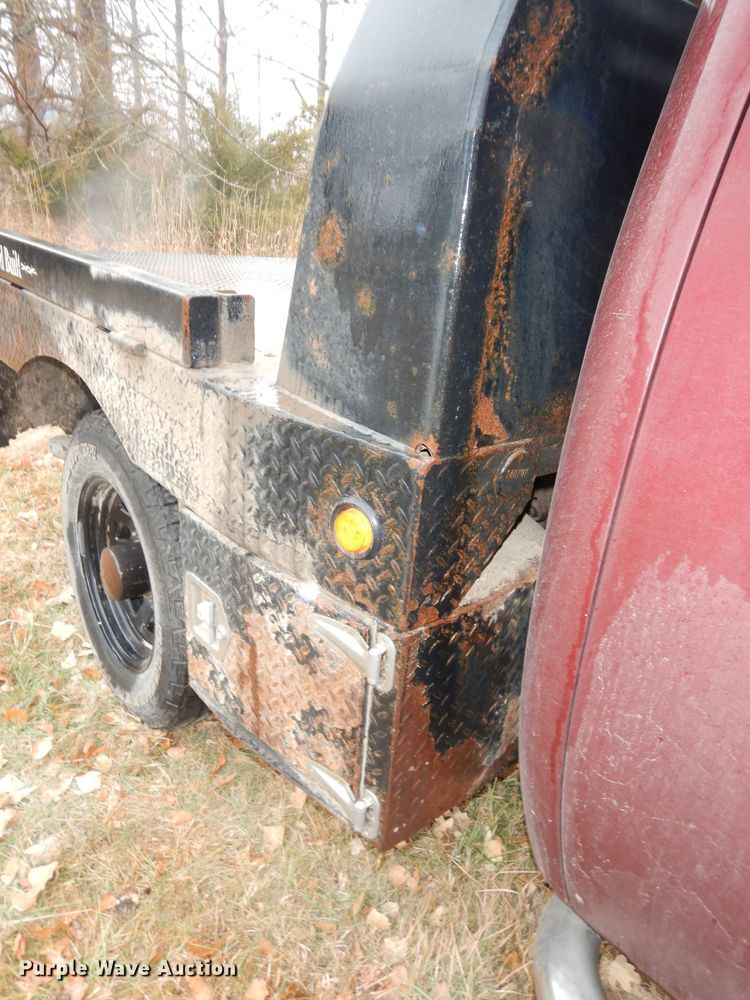 image for item DI6971 2009 GMC Sierra 2500HD  Ext. Cab flatbed pickup truck